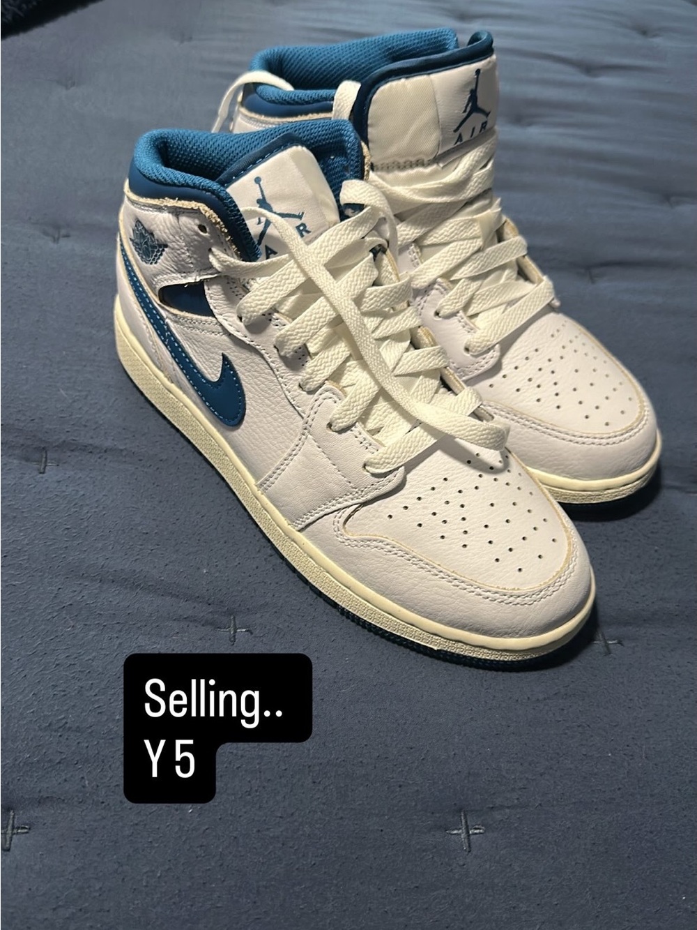 Jordan Retro High Top Sneakers in White and Blue
